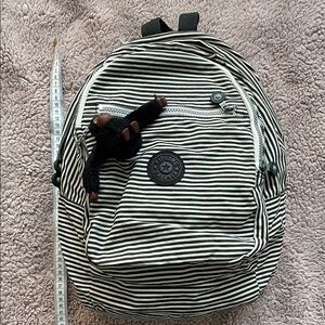 Kipling Black & White Striped Backpack with Monkey Charm
